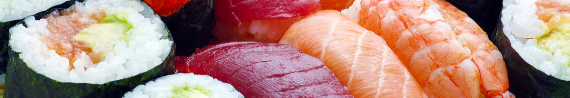Eating Japanese Seafood Sushi at Sapporo Japanese Steakhouse & Sushi restaurant in Monterey, CA.